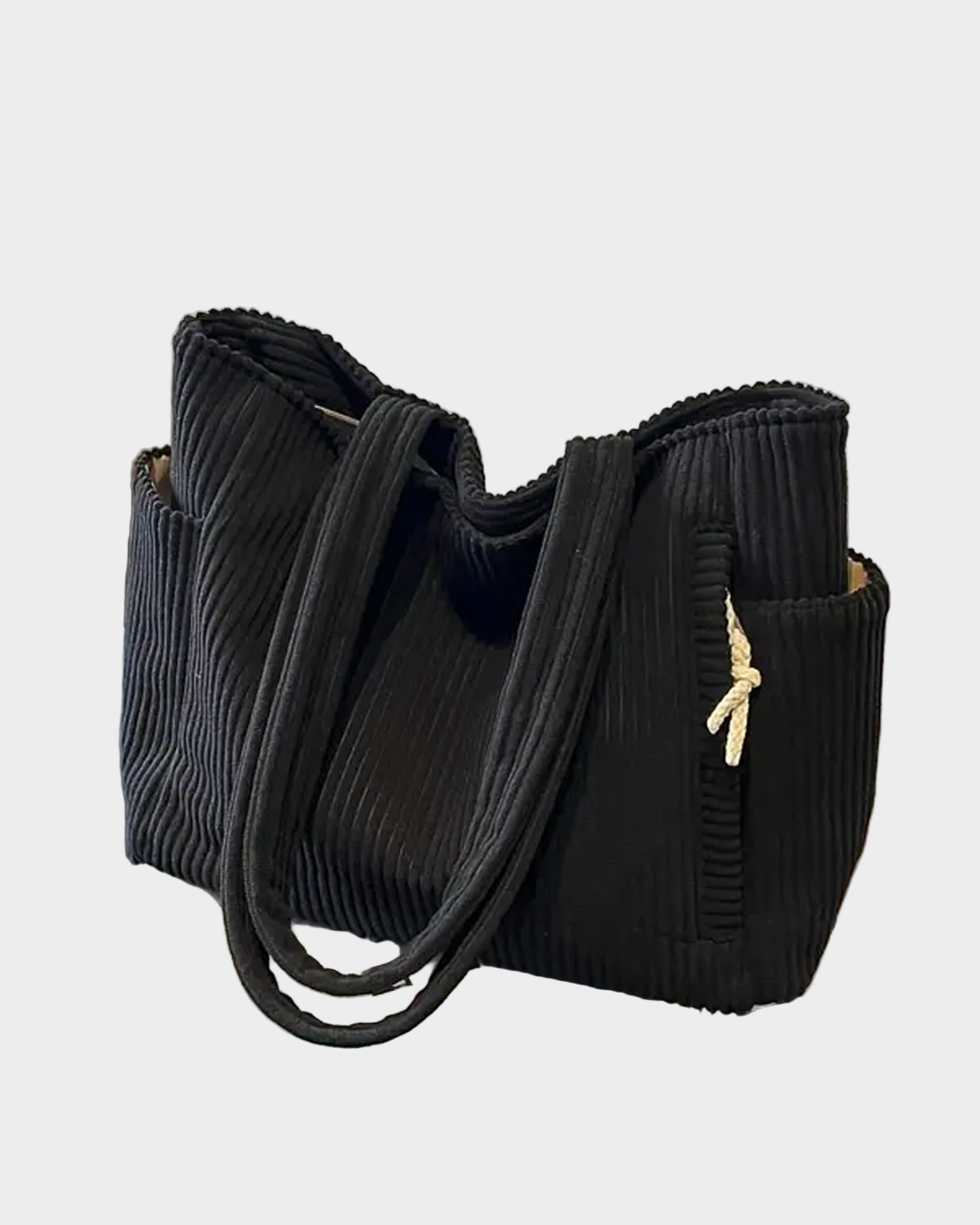 Torebka na ramię pleciona z detalami sznurka i nowoczesną elegancją